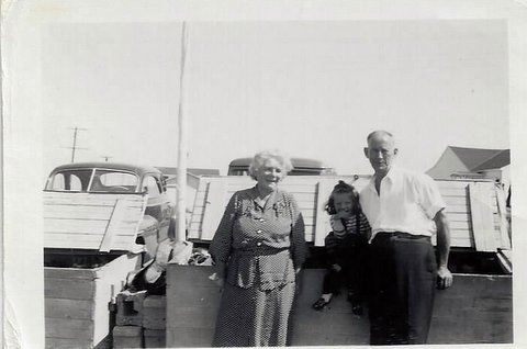1949: Linda with her maternal grandparents by the oar boxes that sat on the beach between the north and center docks.